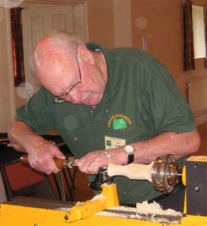 Pat Hughes boring the hole for his bud vase